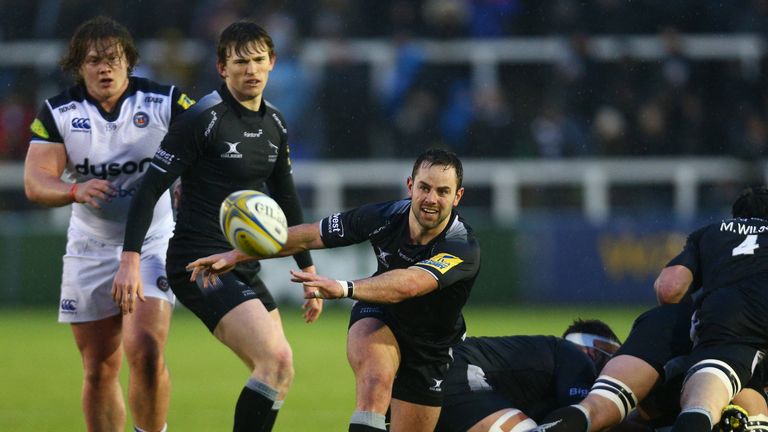 Newcastle scrum-half Micky Young passes the ball