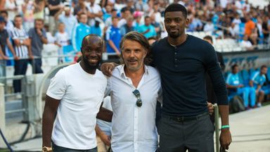 Image of Abou Diaby (right) alongside Marseille president Vincent Labrune (centre) and Lassana Diarra after signing for the French club last summer