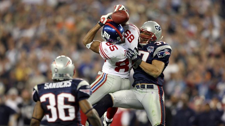 David Tyree clings on for a game-defining catch as the New York Giants upset the New England Patriots in Super Bowl XLII