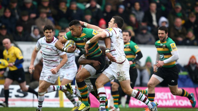 Saints centre Luther Burrell is tackled by Fergus Mulchrone