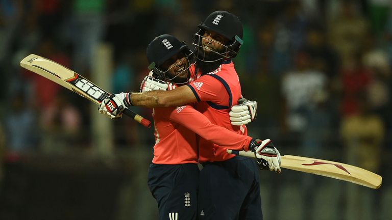 Adil Rashid and Moeen Ali celebrate England's moment of triumph over South Africa