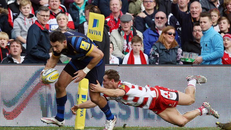 Bryce Heem evades Gloucester's Callum Braley to score one of his two tries
