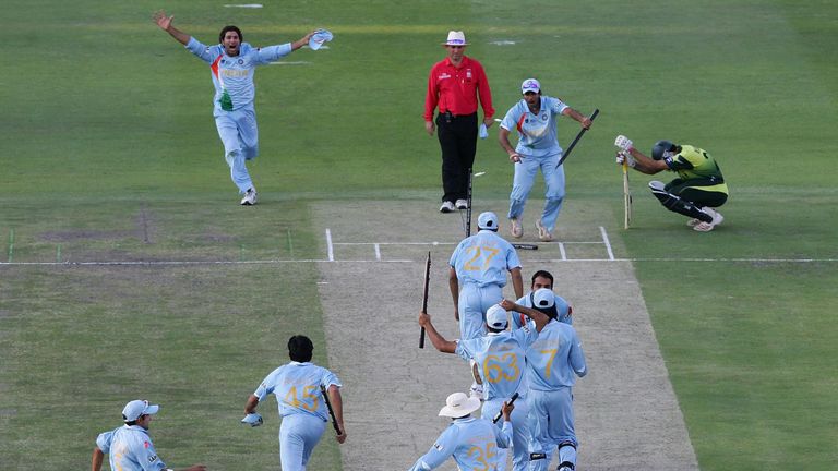 India celebrate their trophy-clinching victory over Pakistan