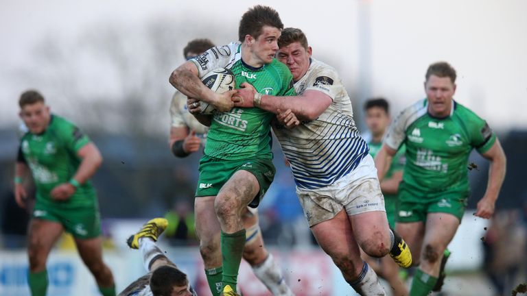 Connacht fly-half AJ MacGinty is tackled by Tadhg Furlong