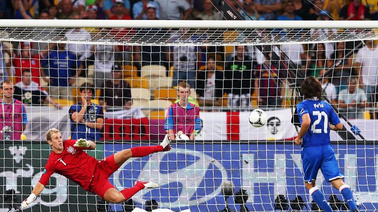 Andrea Pirlo of Italy chips the ball in the penalty shootout past Joe Hart