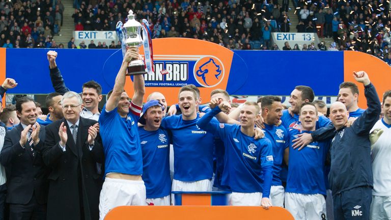 Captain Lee McCulloch lifts the old Scottish Third Division trophy