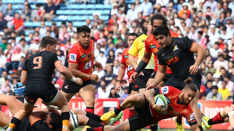 Derek Carpenter dives over for a try during the Sunwolves' clash with the Jaguares in Tokyo