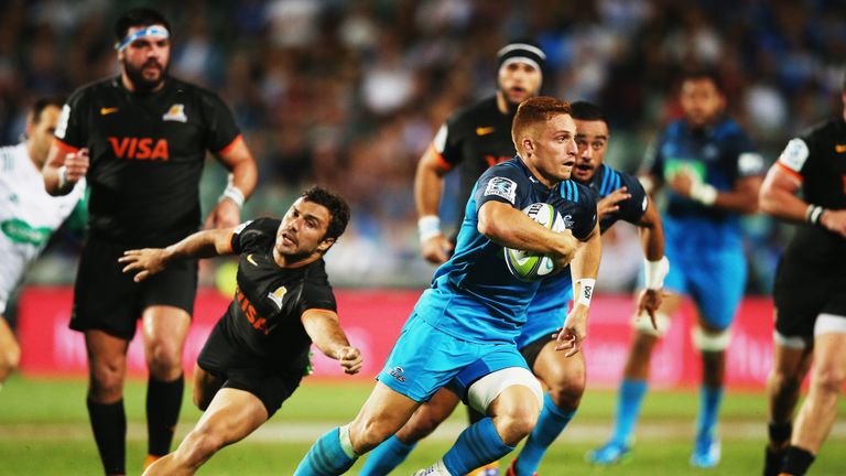 Ihaia West of the Blues makes a break to score a try for the Blues against the Jaguares