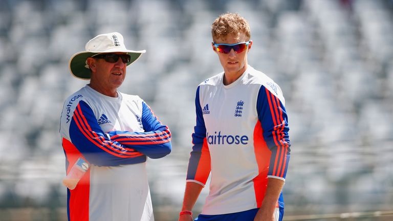 Joe Root (right) has praised the influence of head coach Trevor Bayliss (left)