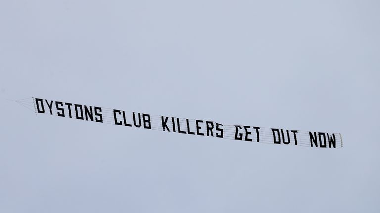 A protest banner reading 'Oystons club killers get out now' was flown over the stadium
