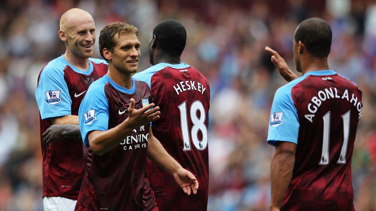 Petrov (2nd left) retired from football professional in 2013