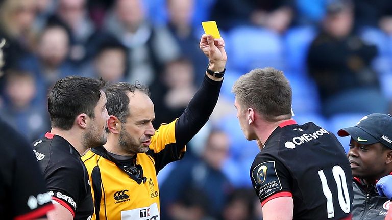 Owen Farrell is shown the yellow card by referee Romain Poite