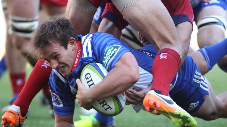 Scrum-half Nic Groom dives over to score