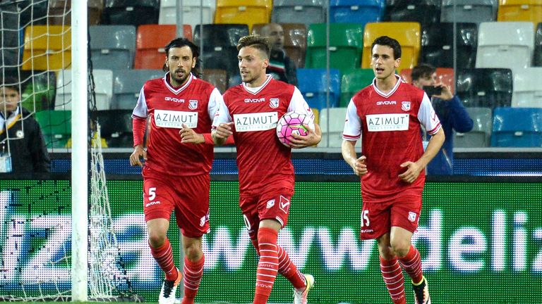 Simone Verdi (centre) of Carpi celebrates after scoring