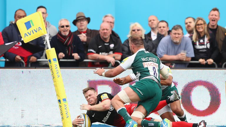 Chris Ashton goes over the line to score a try against Leicester