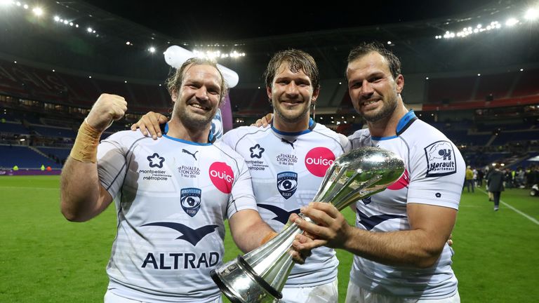 Jannie du Plessis (l) celebrates winning the Challenge Cup final with brother Bismarck (r) and Francois Steyn