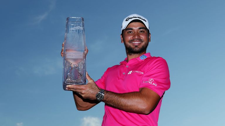 Jason Day lifts the trophy after his victory at TPC Sawgrass on Sunday