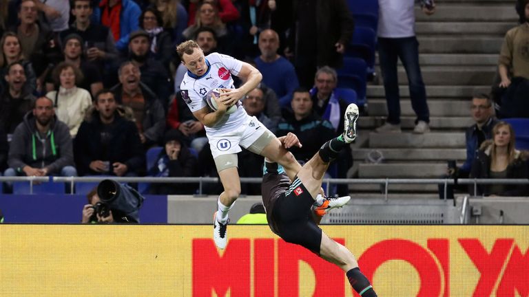 Jesse Mogg  beats Jamie Roberts in the air to score