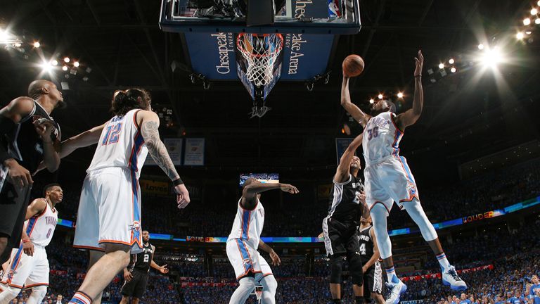Kevin Durant (No 35) finished with 37 points as Oklahoma sealed a Western Conference finals spot