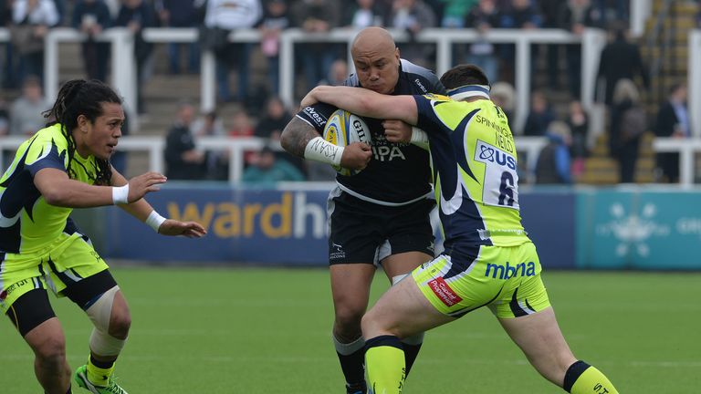  Nili Latu is tackled by Sale's Cameron Neild 