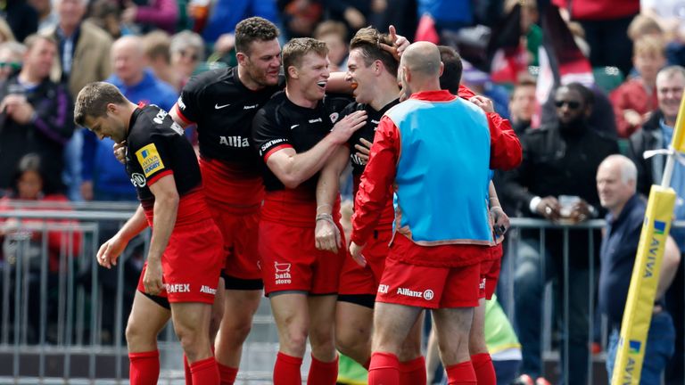 Saracens' Chris Wyles celebrates scoring their fourth try