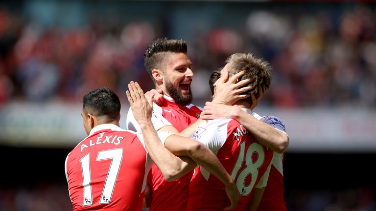 Arsenal striker Olivier Giroud (centre) celebrates his opener with team-mate Nacho Monreal