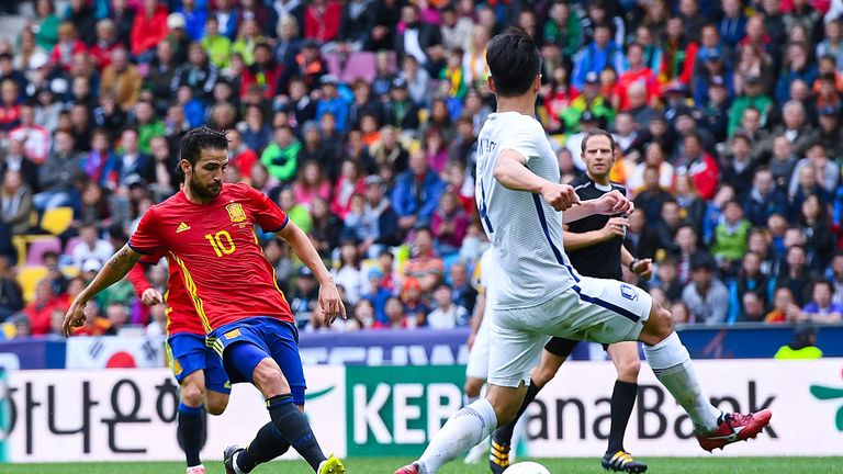 Cesc Fabregas of Spain scores his team's second goal