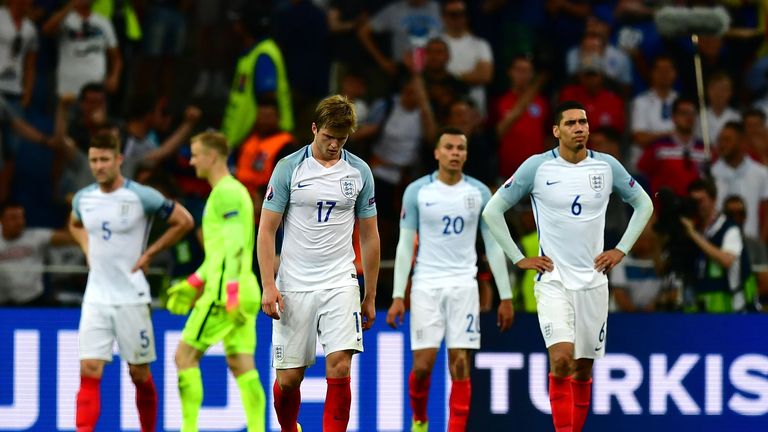 The England players look dejected after conceding late on