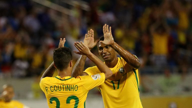 Coutinho and Walace celebrate