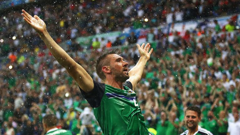 Gareth McAuley of Northern Ireland celebrates scoring Northern Ireland's opener