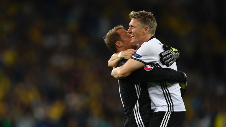 Schweinsteiger (r) and Manuel Neuer celebrate after Germany's win