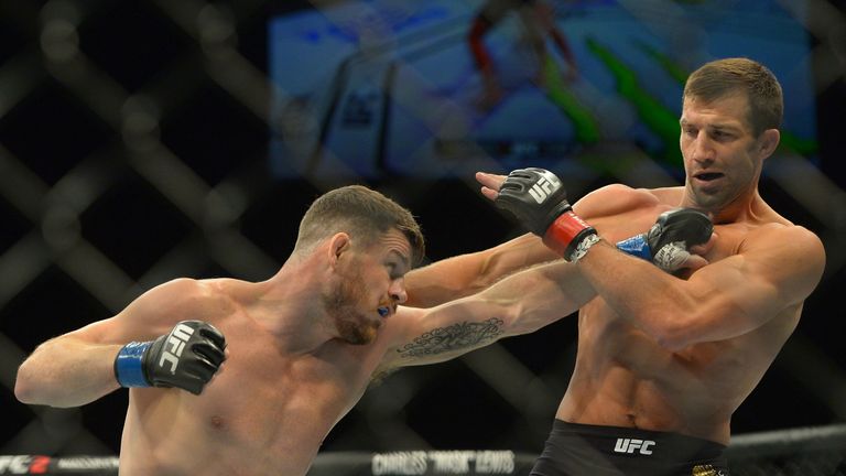 Michael Bisping (left) stepped in on short-notice to beat Luke Rockhold for the middleweight title