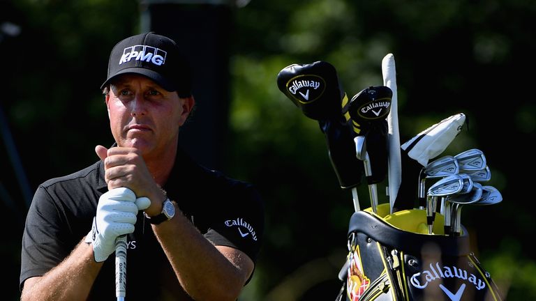 Mickelson faces an anxious wait to see if he will play the final two rounds