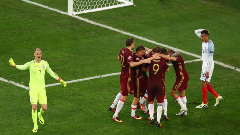 Russia celebrate after salvaging a late draw against England