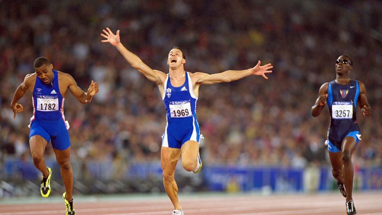Konstantinos Kenteris wins 200m Olympic gold in 2000 ahead of Campbell (left)