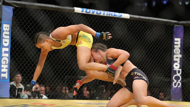 Miesha Tate (right) takes down Amanda Nunes