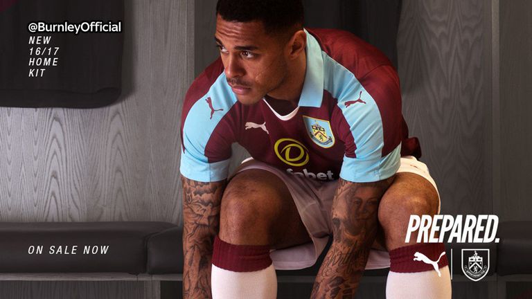 Andre Gray models Burnley's new home kit ahead of their return to the Premier League (Image c/o Burnley/Puma)