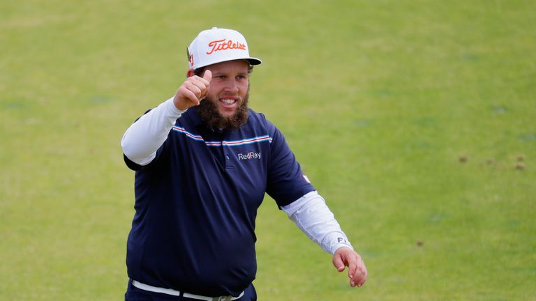 Johnston acknowledges the fans as he heads to the final green at Royal Troon