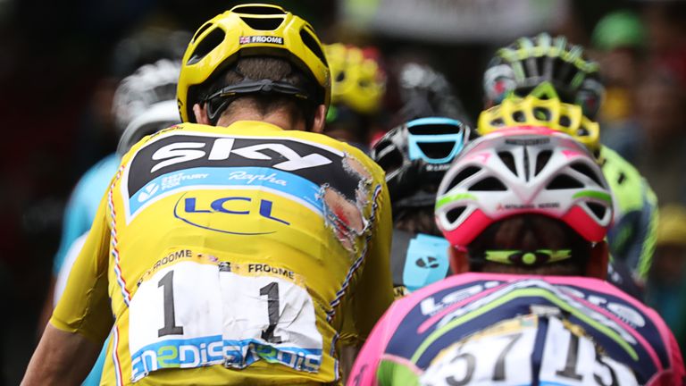 Froome suffered cuts to his right arm and leg and road rash to his back