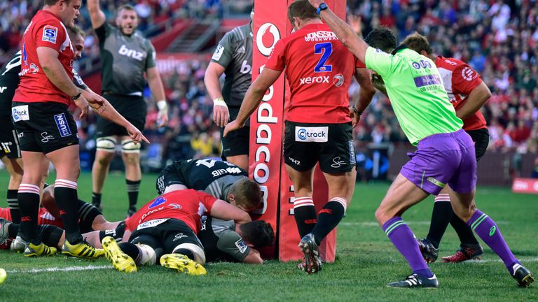 Crusaders' Ryan Crotty dives over for a try