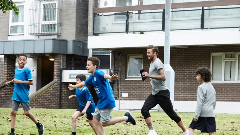 Beckham jogs across town in the advert