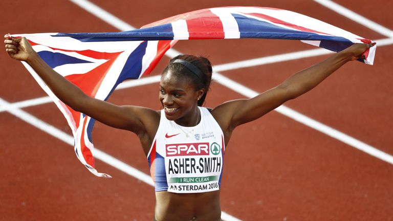 Dina Asher-Smith celebrates after winning gold at the European Championships