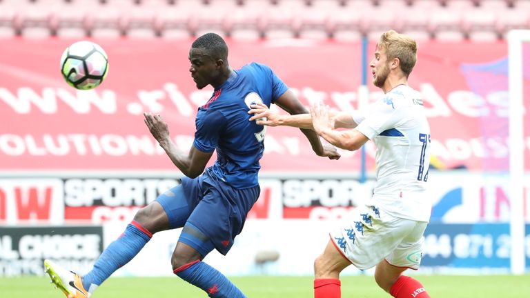 Eric Bailly (left) played 82 minutes of Manchester United's friendly win at Wigan