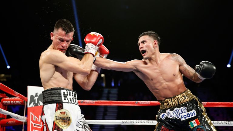 Jose Benavidez (R) remained unbeaten by out-pointing Francisco Santana