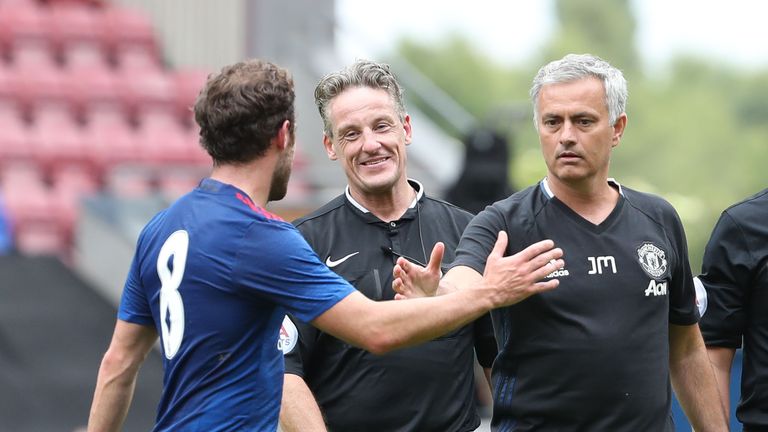 Mourinho (right) says Juan Mata is happy at Man United and ready to fight for his place