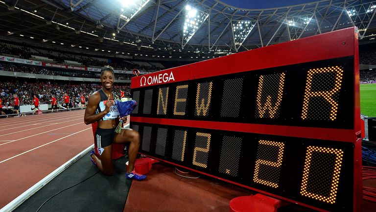 Kendra Harrison celebrates her world record run