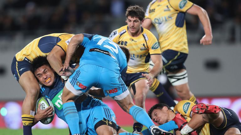 Male Sa'u is brought to ground as the Blues defeated the Brumbies in Auckland 