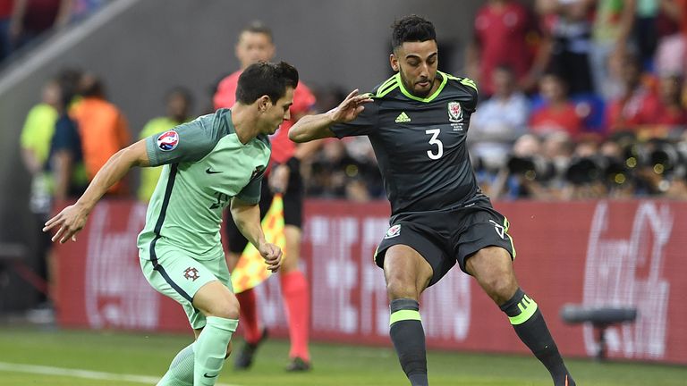 Neil Taylor (right) looks to get the better of Cedric Soares (left)