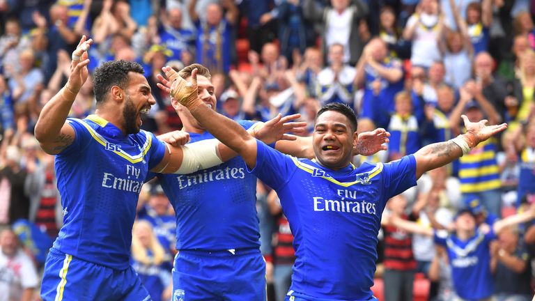 Chris Sandow (right) celebrates scoring Warrington's fourth try 