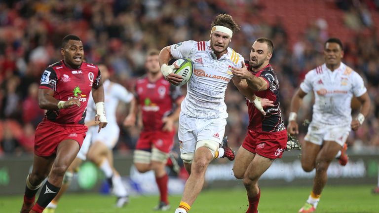 The Chiefs' Lachlan Boshier races clear of the Reds defence